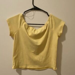 set of two VIBE sportswear tops in the color yellow and navy blue.